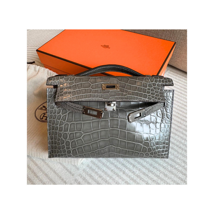Kelly pochette gris ciment phw lisse alligator