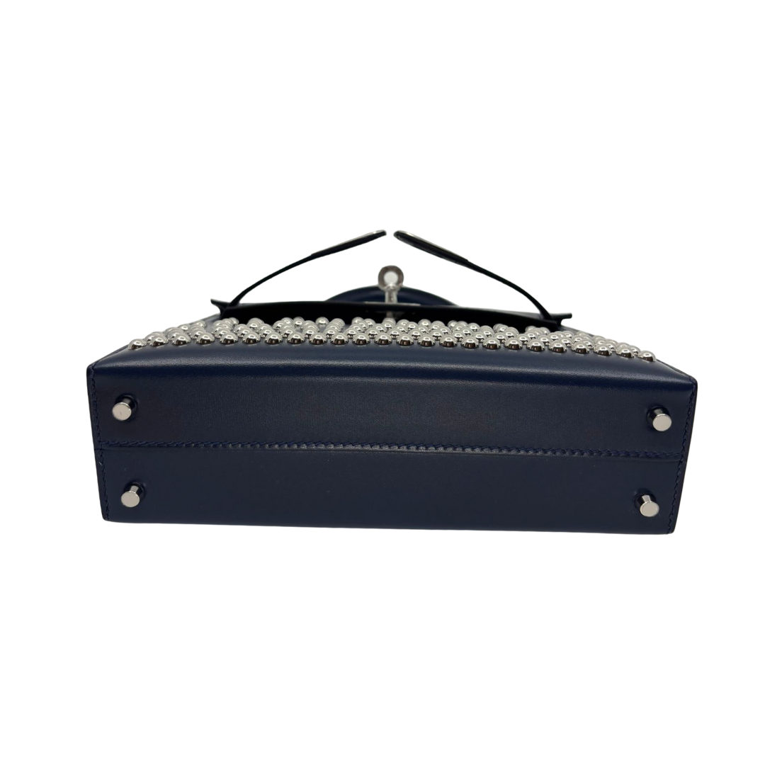 Kelly mini stud bleu abysse veau box