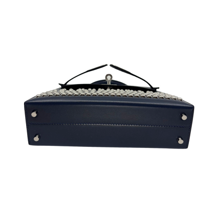 Kelly mini stud bleu abysse veau box