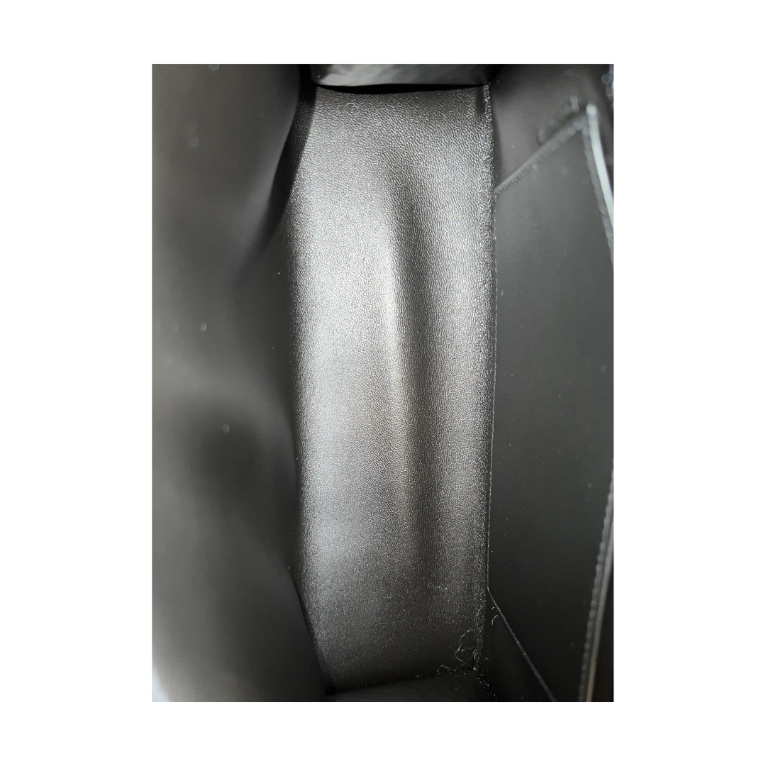 Kelly pochette black porosus lisse ghw