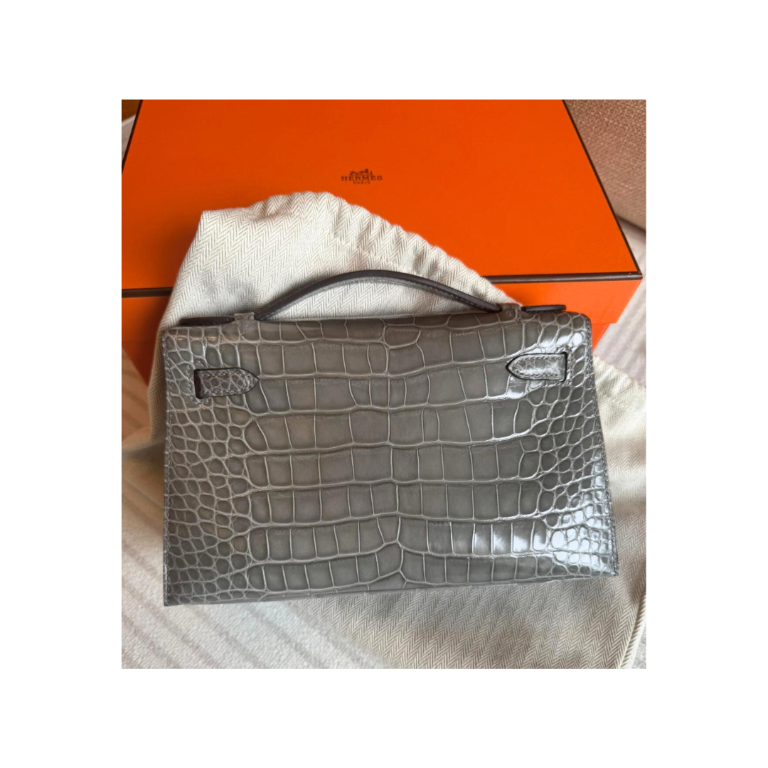 Kelly pochette gris ciment phw lisse alligator