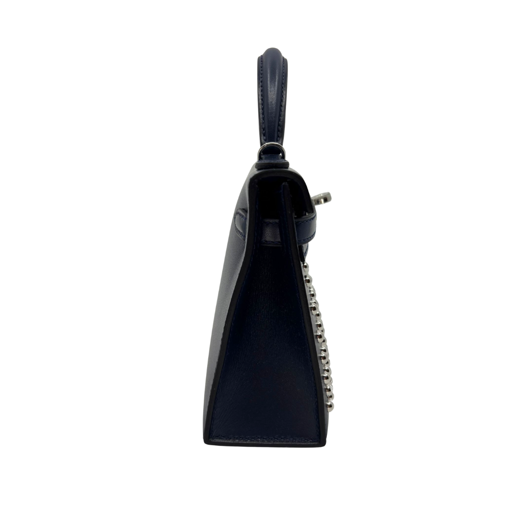 Kelly mini stud bleu abysse veau box