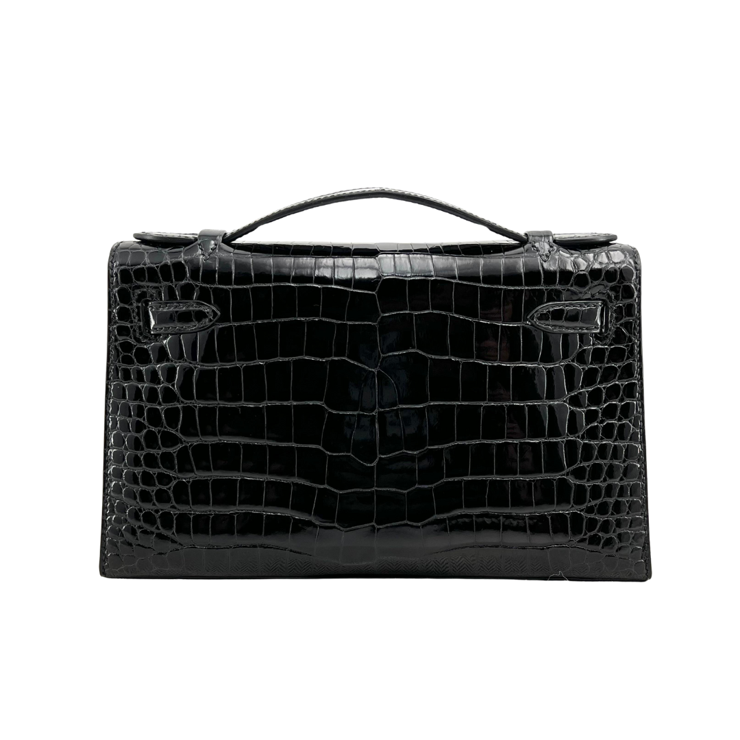 Kelly pochette black porosus lisse ghw