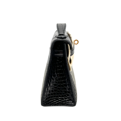 Kelly pochette black porosus lisse ghw