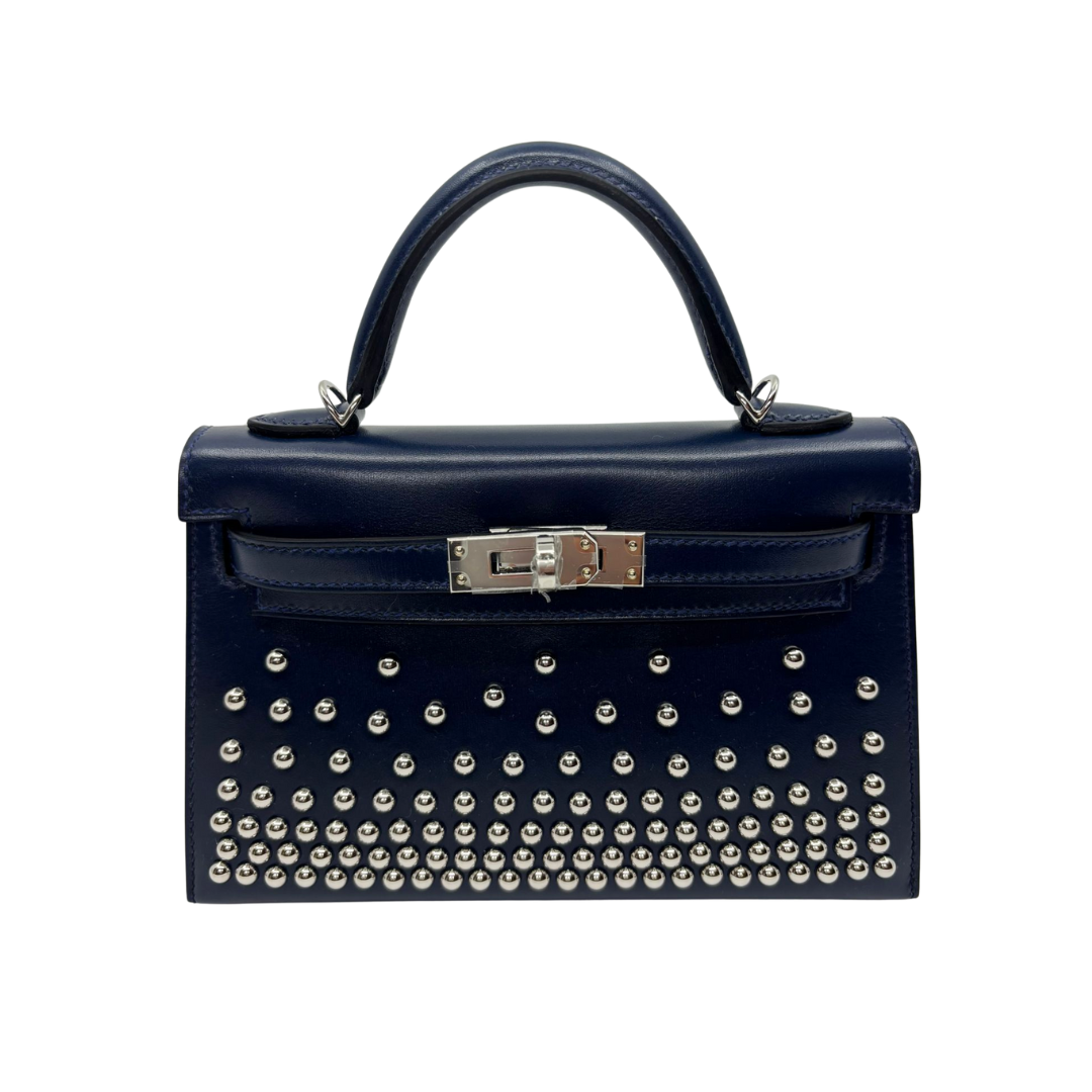 Kelly mini stud bleu abysse veau box